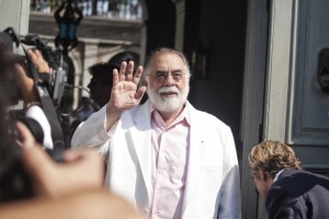 US film director Francis Ford Coppola waves to onlookers as he arrives at Palazzo Margherita before the wedding of his daughter Sofia with French rock singer Thomas Mars on August 27, 2011 in Bernalda. The wedding will take place in Palazzo Margherita, the 19th-century villa that Coppola's legendary filmmaker father Francis Ford Coppola restructured in the town, La Stampa daily reported without citing a source. Sophia Coppola was previously married to director Spike Jonze, whom she divorced in 2003, four years after their wedding. She and Mars, the lead singer in the French rock band Phoenix, have two children and live in Paris. AFP PHOTO / ANDREA BALDO (Photo credit should read ANDREA BALDO/AFP/Getty Images)